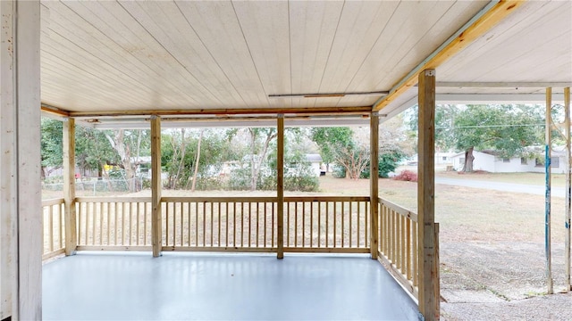 unfurnished sunroom featuring a healthy amount of sunlight