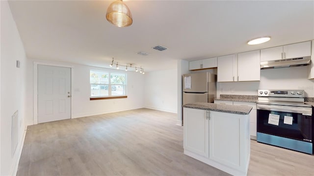 kitchen with stainless steel appliances, stone counters, white cabinets, light hardwood / wood-style floors, and a kitchen island