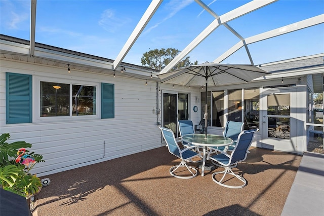 view of patio / terrace with glass enclosure