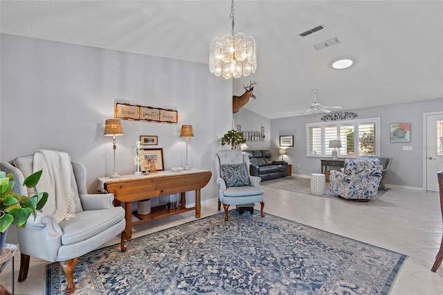 living area featuring light tile patterned floors and ceiling fan with notable chandelier