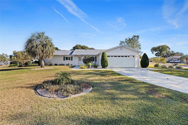 ranch-style home with a garage and a front yard