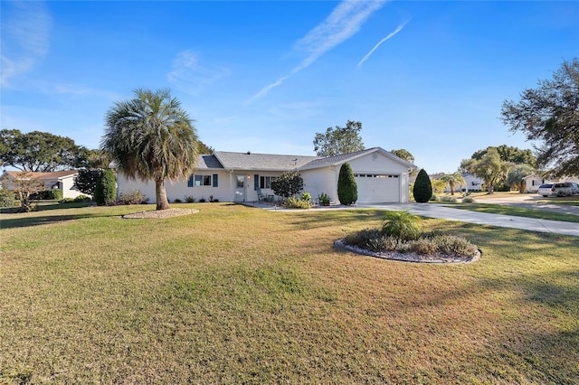 ranch-style home featuring a front yard and a garage