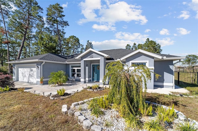 view of front of home featuring a garage