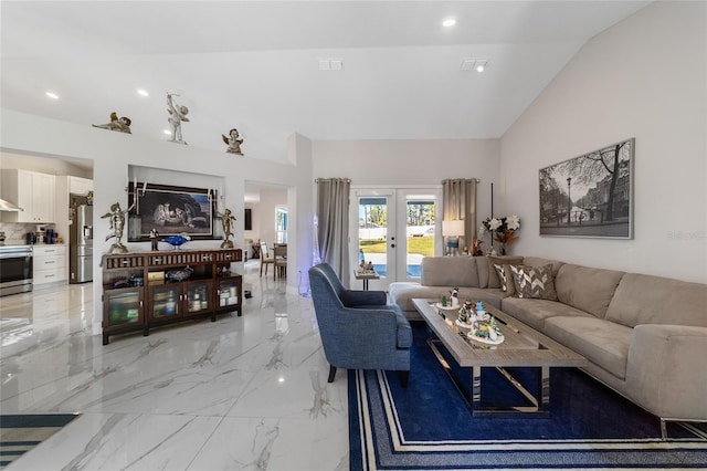 living room with french doors and high vaulted ceiling