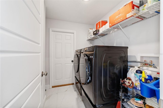 laundry area with washer and dryer