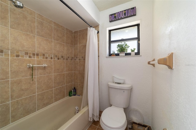 bathroom featuring shower / bath combination with curtain and toilet