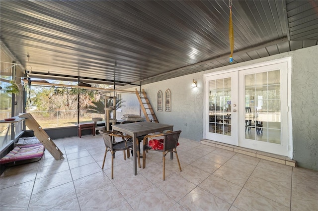 sunroom / solarium with french doors