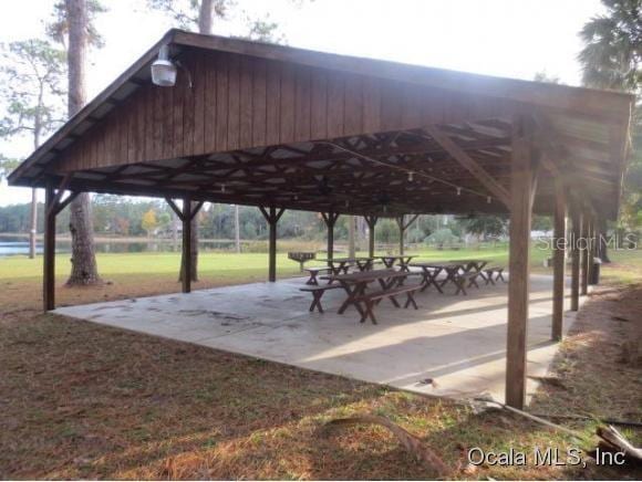 view of home's community featuring a gazebo and a water view