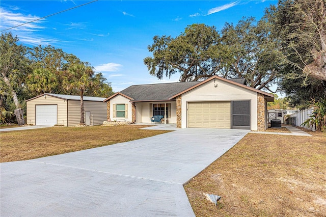 ranch-style house with a front lawn and a garage