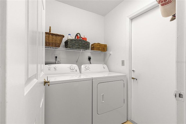 laundry area featuring washer and clothes dryer