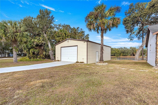 garage with a lawn