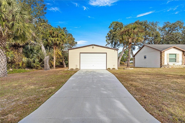 garage with a yard