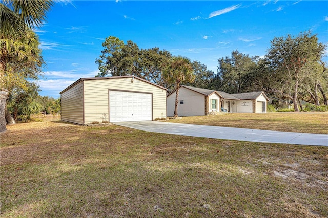 garage with a yard