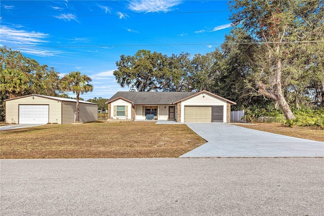 single story home with a garage and a front lawn