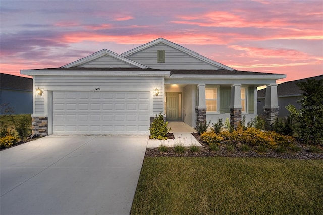 6071 SW 93rd Loop, Ocala, FL 34476 - view of front of property with stone siding, concrete driveway, a garage, a lawn, and covered porch