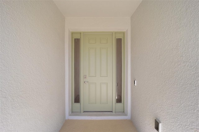 6071 SW 93rd Loop, Ocala, FL 34476 - view of exterior entry with stucco siding
