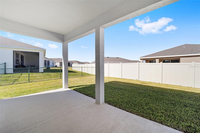 6071 SW 93rd Loop, Ocala, FL 34476 - view of yard featuring a patio and a residential view