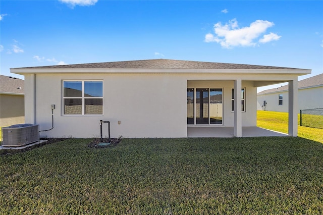 6071 SW 93rd Loop, Ocala, FL 34476 - rear view of house featuring cooling unit, a patio area, and stucco siding