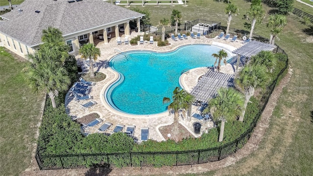 6071 SW 93rd Loop, Ocala, FL 34476 - community pool with a patio