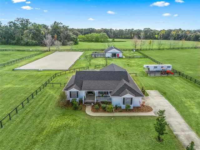 birds eye view of property featuring a rural view