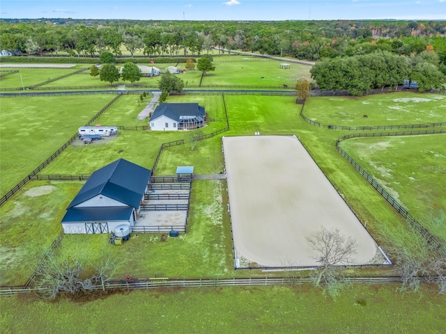 birds eye view of property featuring a rural view