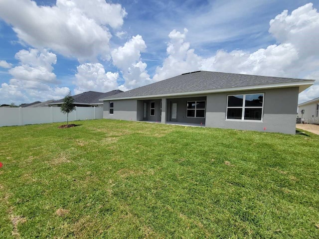 8309 SW 58th Ave, Ocala, FL 34476 - rear view of house with stucco siding and roof with shingles