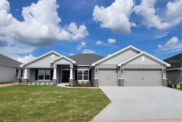 8309 SW 58th Ave, Ocala, FL 34476 - craftsman-style home featuring an attached garage, driveway, and a front yard