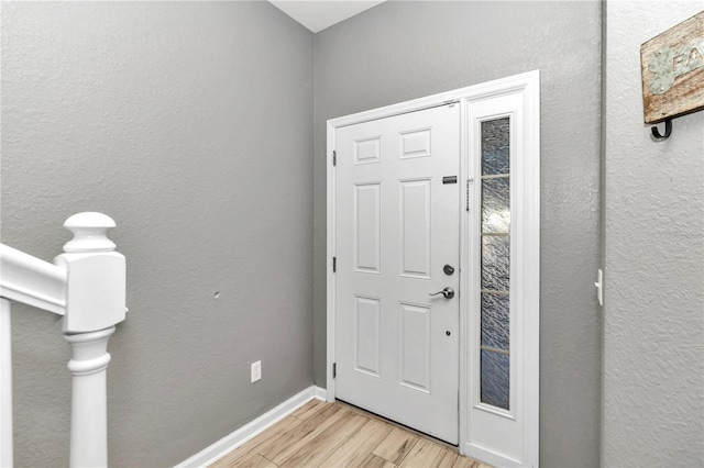 foyer entrance featuring light hardwood / wood-style flooring