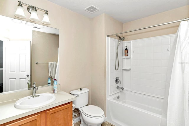 full bathroom with a textured ceiling, vanity, shower / bath combo, and toilet