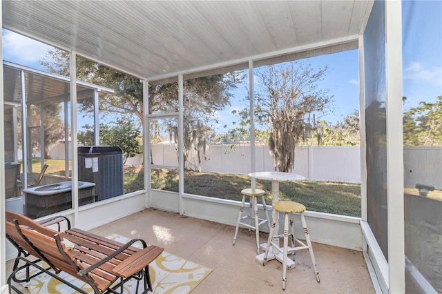 sunroom / solarium featuring plenty of natural light