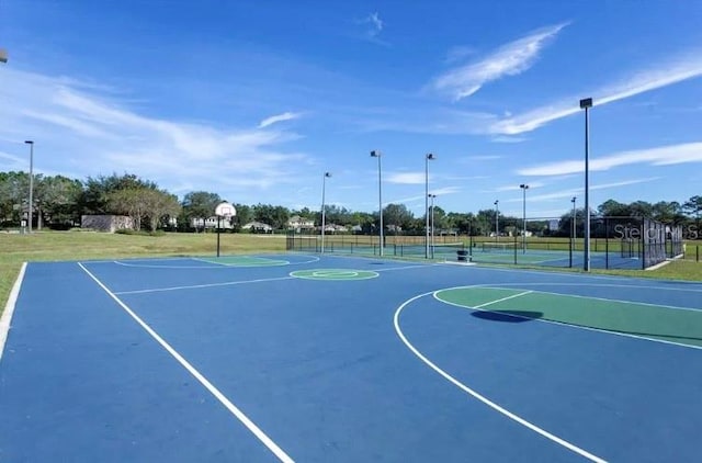 view of basketball court with tennis court