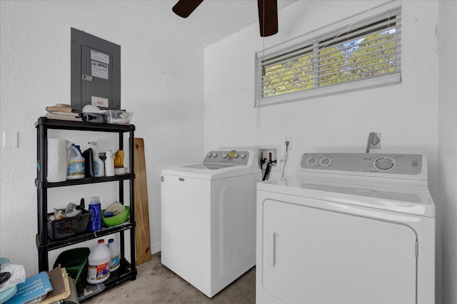 washroom featuring washer and dryer and a textured ceiling