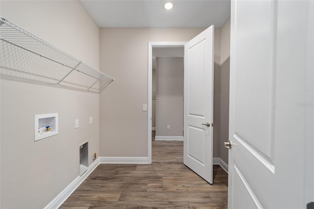 laundry area featuring hookup for a washing machine and hardwood / wood-style flooring