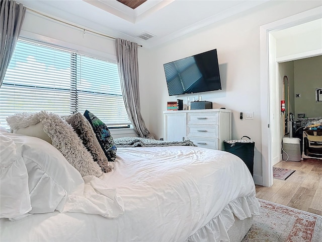 bedroom with light hardwood / wood-style flooring