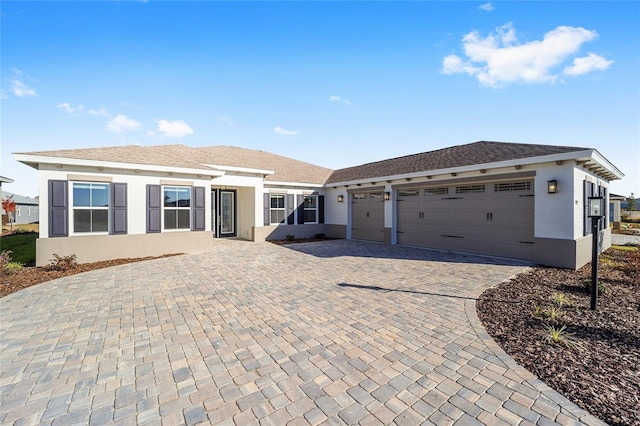 ranch-style house featuring a garage