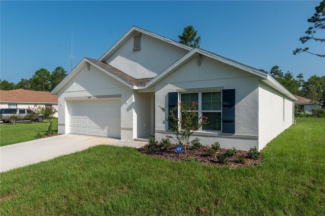 view of front of house featuring a garage and a front lawn