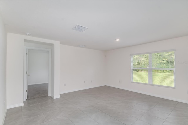 view of tiled spare room