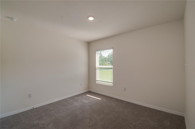 view of carpeted spare room