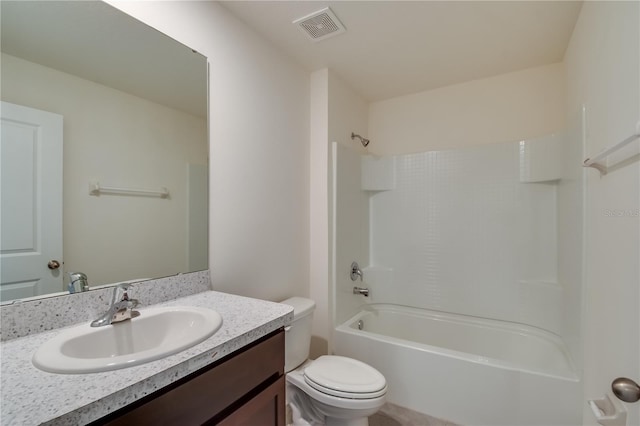 full bathroom featuring bathtub / shower combination, vanity, and toilet