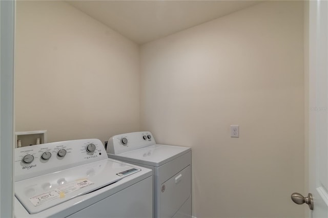 laundry room with washer and dryer