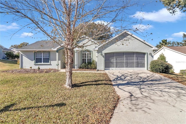 ranch-style house with a garage and a front yard