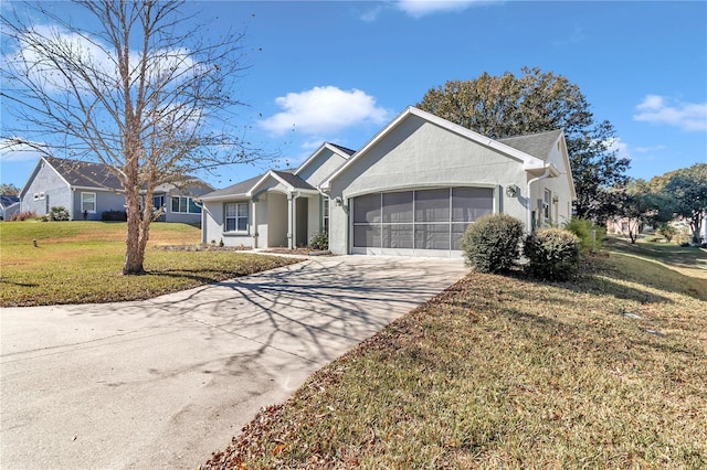 ranch-style home with a front lawn and a garage