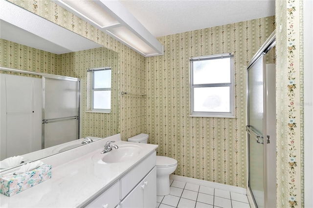 bathroom with tile patterned floors, an enclosed shower, and toilet