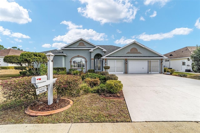 ranch-style home with a garage