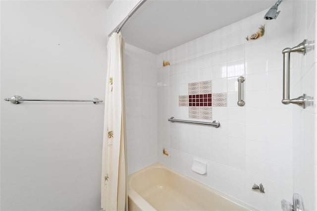 bathroom featuring shower / bath combo with shower curtain