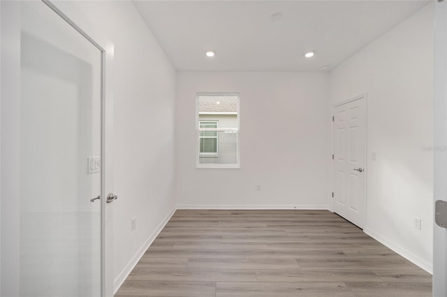 empty room featuring light hardwood / wood-style floors