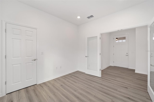 entrance foyer with light wood-type flooring