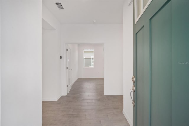 hall featuring light hardwood / wood-style floors