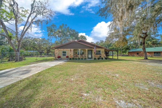 ranch-style house with a front lawn and a carport