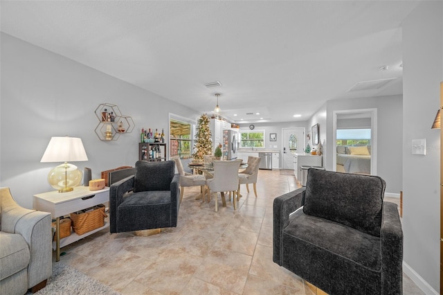 living room with light tile patterned floors